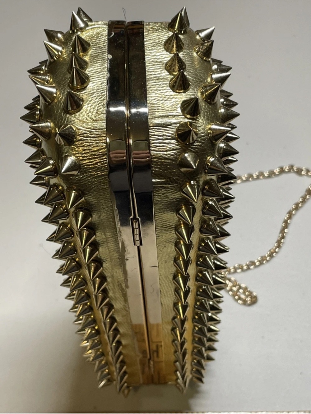 Edgy style Gold Spike Evening Clutch/ crossbody bag with skull knuckle handle - Picture 11 of 13